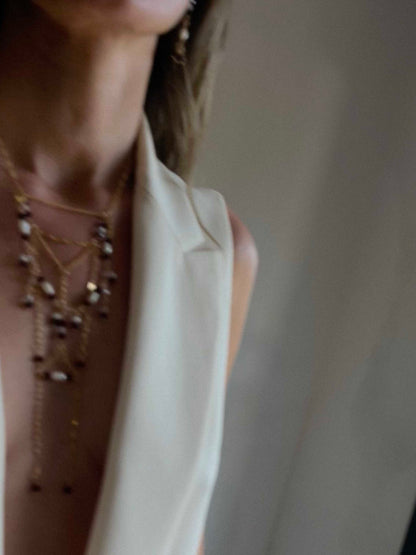 Collar Valentía unido a la pulsera Claroscuro. Joyas transformables.
