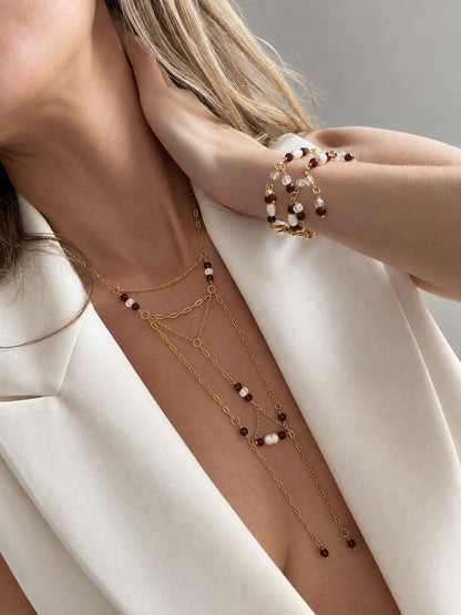 Dos pulseras Claroscuro con collar Valentía.